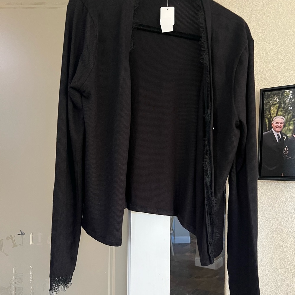 Cute new black sweater.
